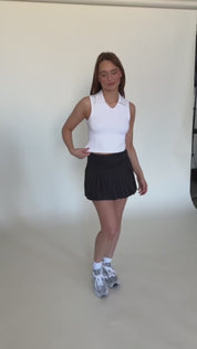Ivory V-Neck Sleeveless Polo Top