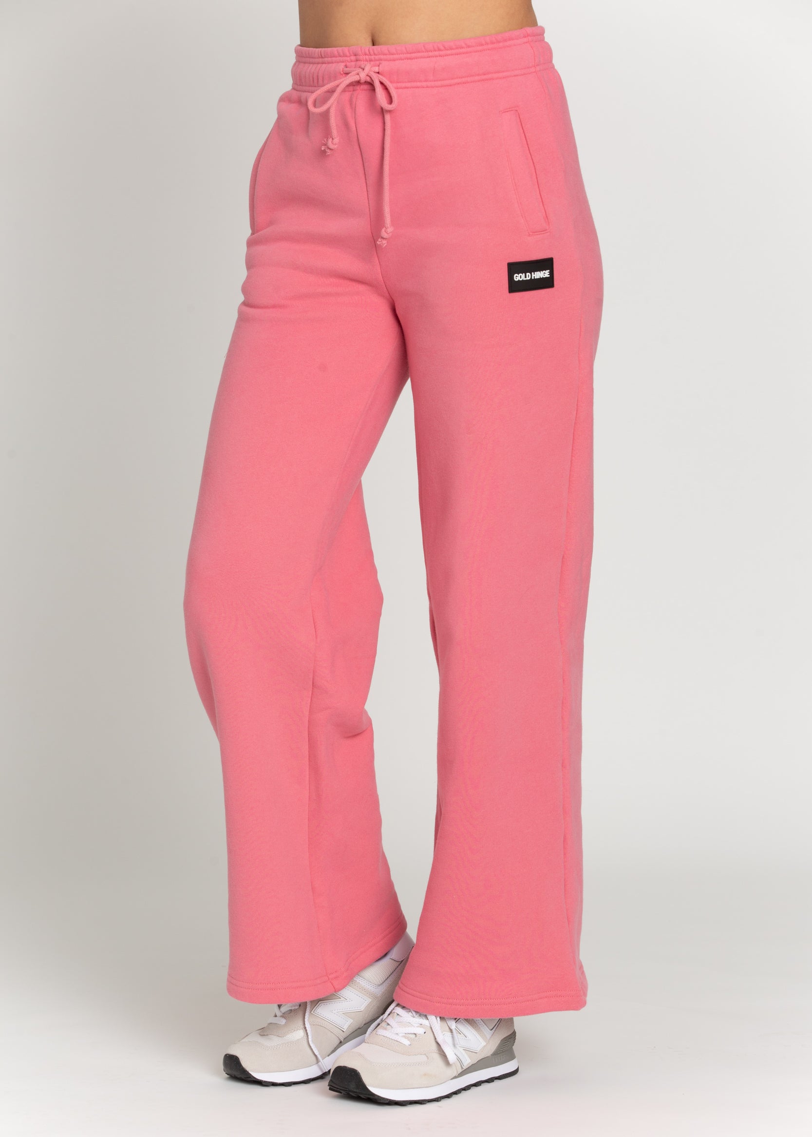 Our Rouge Wide Leg Sweatpants are the perfect combination of style and comfort, with soft fabric and functional pockets. Complete the look with a matching sweatshirt, or pair with any Gold Hinge top. Get them today and enjoy the comfort and convenience they provide.