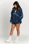 This navy minimalistic half-zip pullover is the perfect way to stay warm and comfortable while looking stylish. The lightweight material is perfect for layering over any outfit and the half-zip design gives it a modern twist.